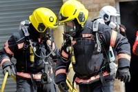 firefighters wearing breathing apparatus