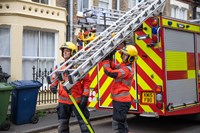 firefighters with ladder