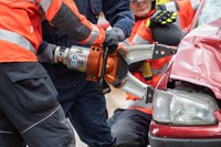 firefighters using spreaders