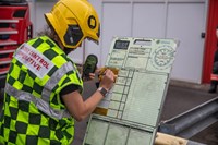 firefighter with BA entry board