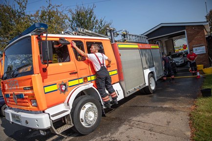 firefighter washing glow the fire engine