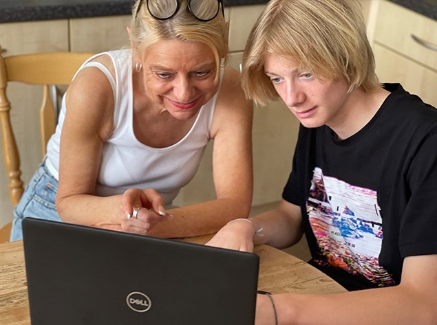 People looking at computer