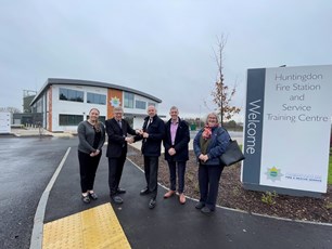 Chief fire officer receiving keys to new building