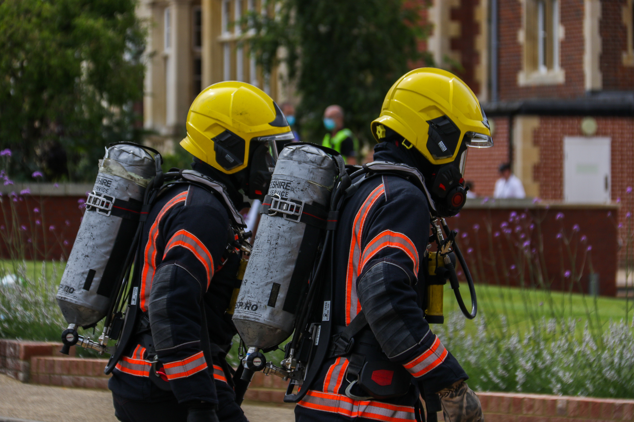 Two firefighters in full kit