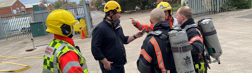 Fire crew with cameraman