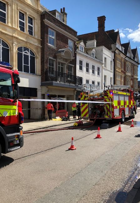 Two fire engines at an incident on Market Hill.