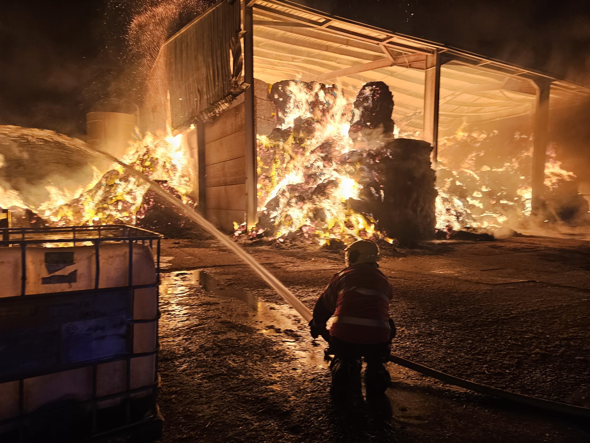Firefighter with hose