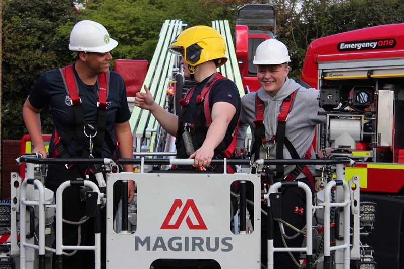 Firefighter with students