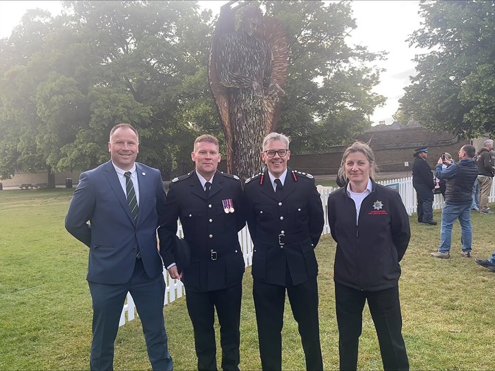 Fire officers with Knife Angel