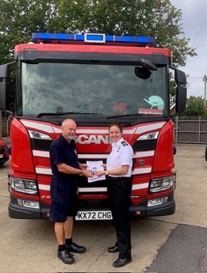 Andy Milton and Area Commander Vicky Best standing in front of a fire engine